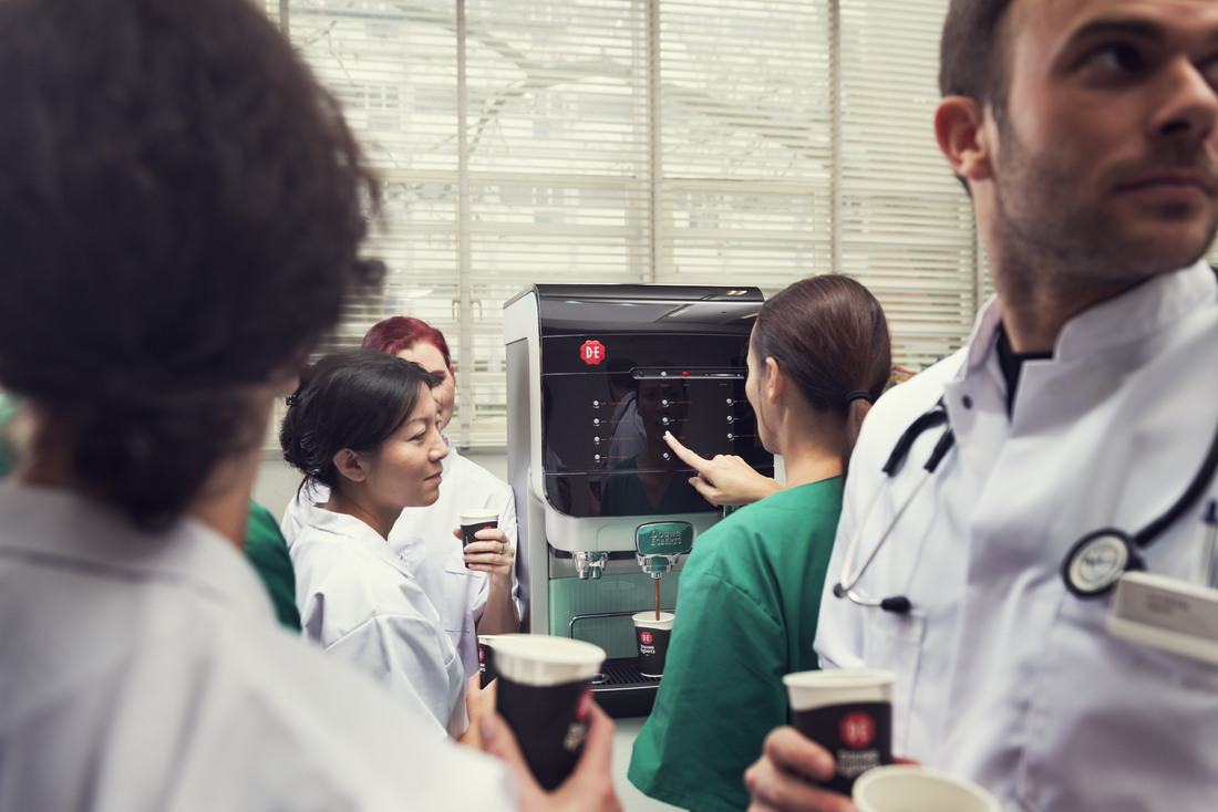 Doctors around coffee solution