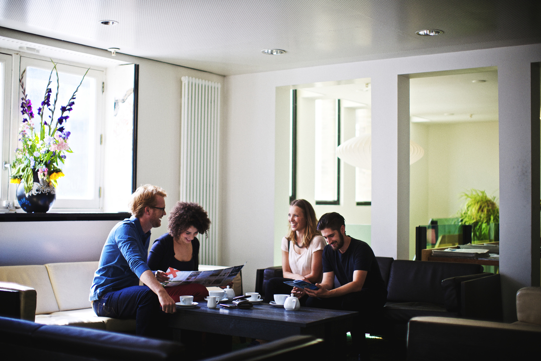 People enjoying coffee together